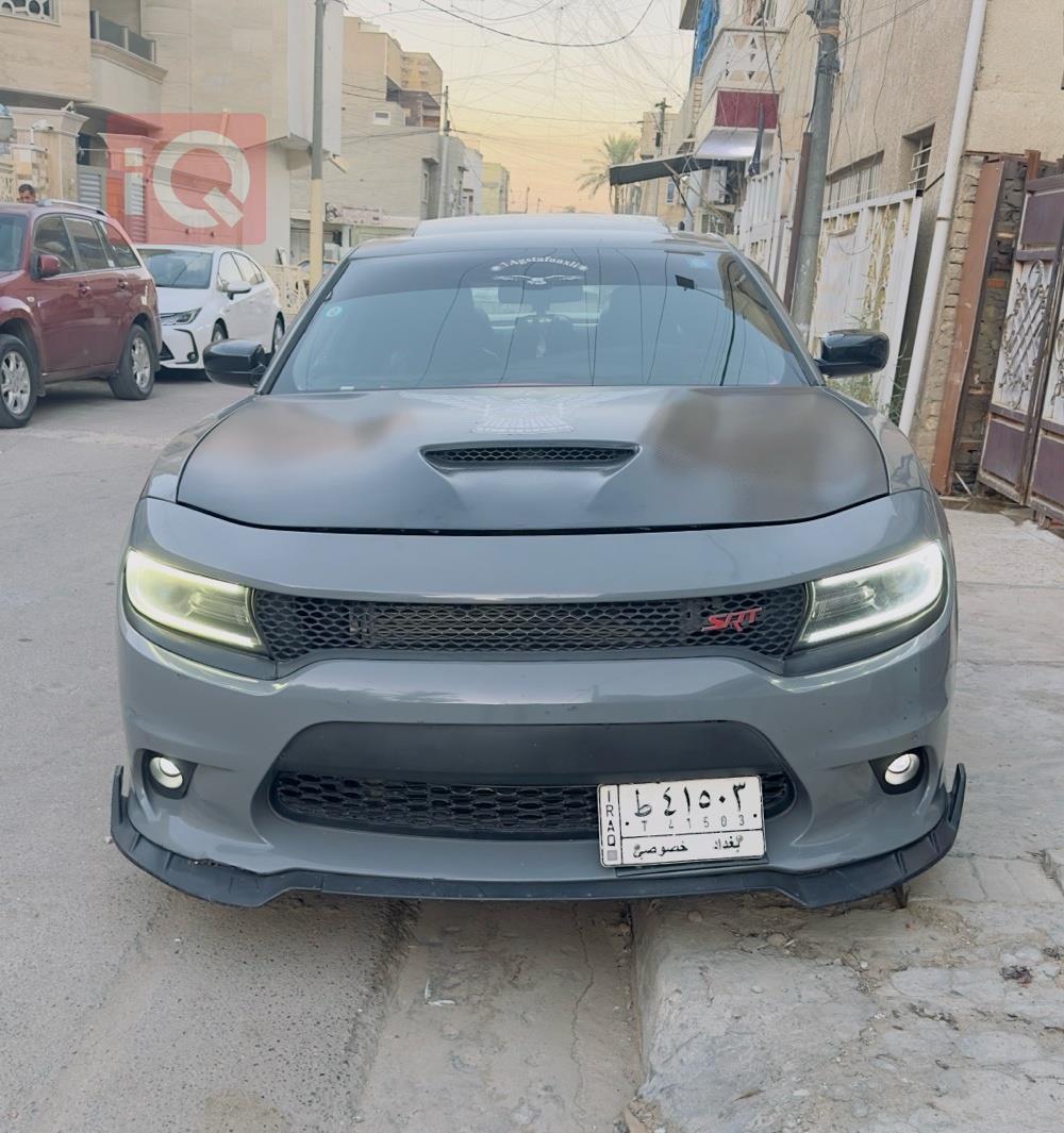 دۆج چارجەر